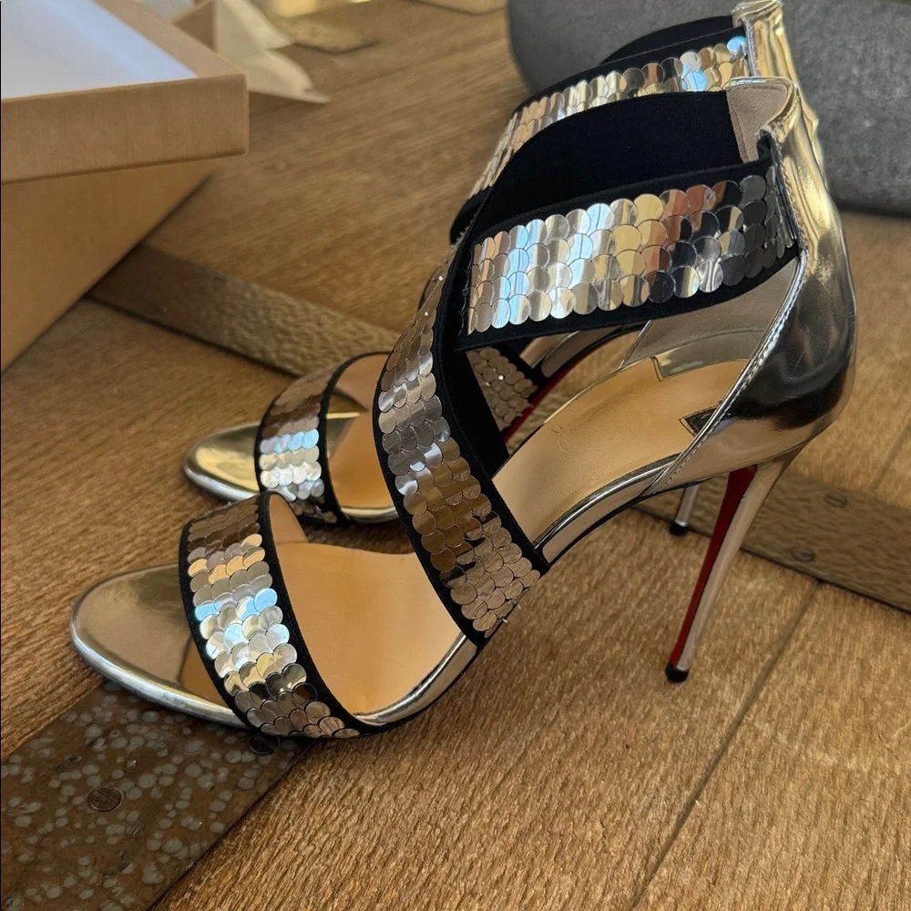 Christian Louboutin preowned please
